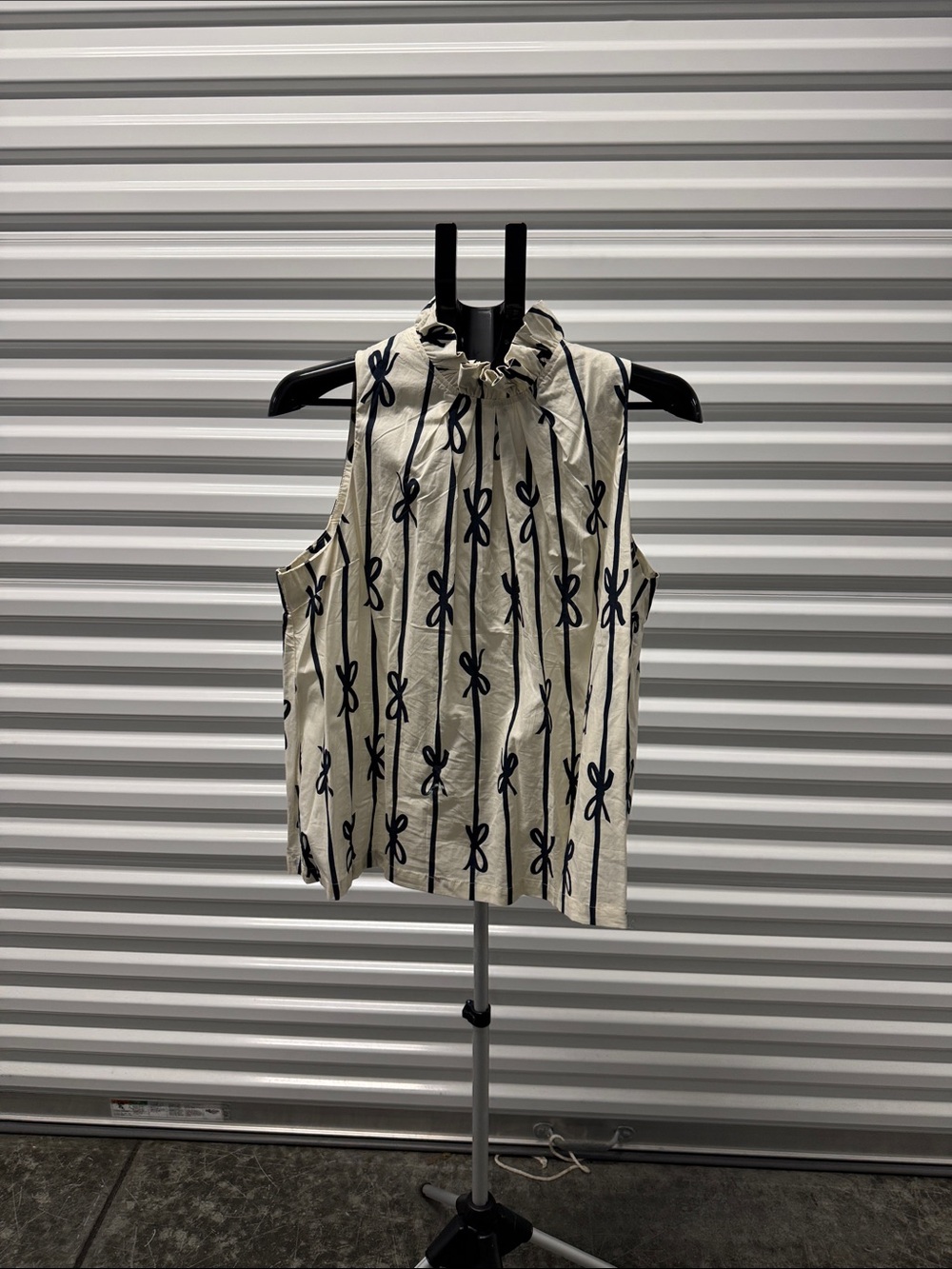 Umgee Cream Sleeveless Ruffle-Neck Top with Navy Bow Stripes